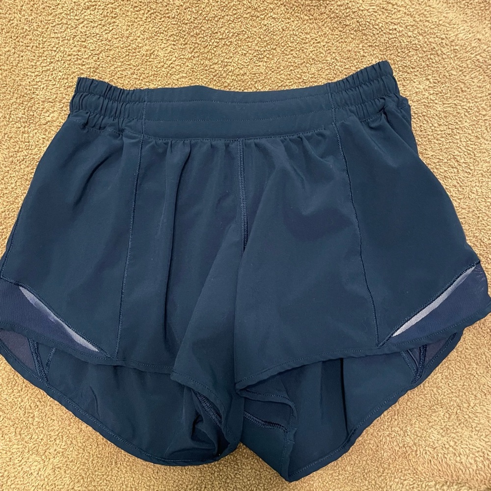 Navy hotty hot low rise 4” shorts